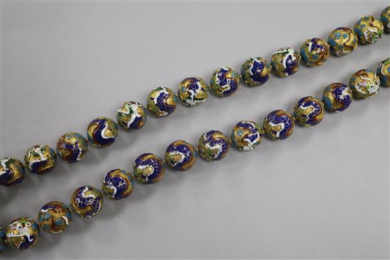 A gilded and cloisonne sphere necklace, approx. 90cm.